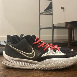 Nike Black and White Athletic Shoes with Red Accents
